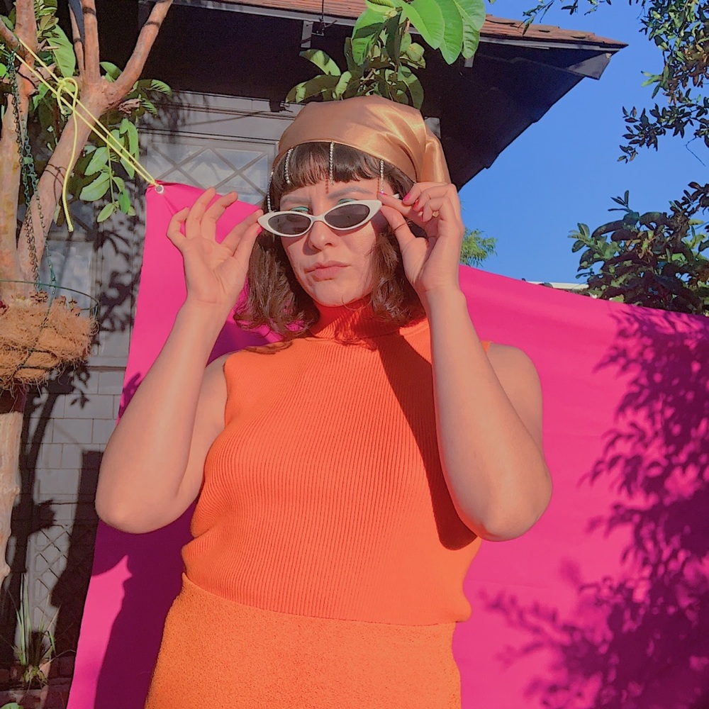 Orange Sleeveless Turtleneck 🔥